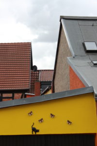Houses, roofs, facade, yellow, cat, butterflies Houses, roofs, facade, yellow, cat, butterflies